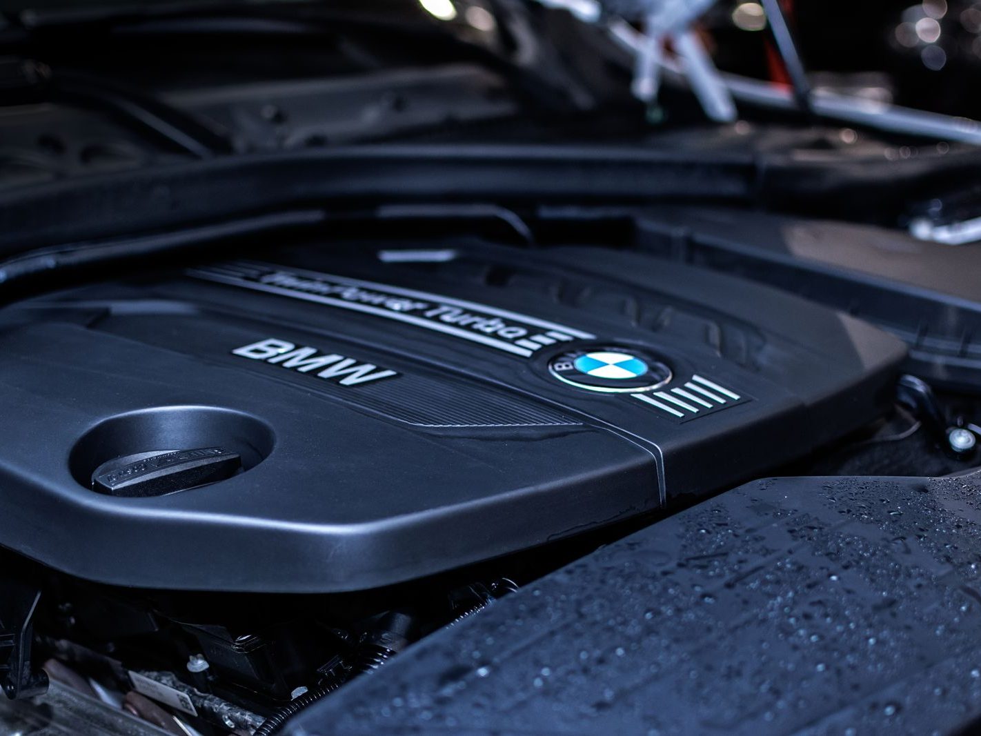 BMW TwinPower Turbo engine cover in a performance car engine bay
